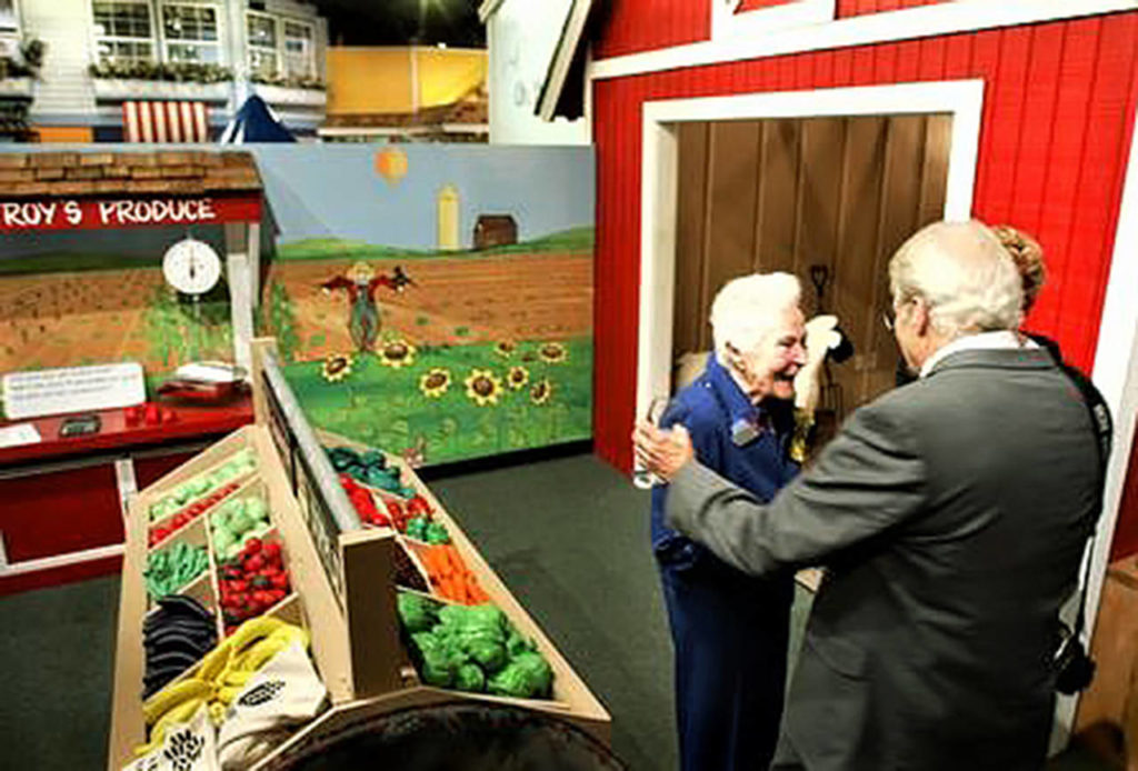 Idamae Schack, who died Jan. 7 at age 102, was greeted by Bill Greaves, architect for the Imagine Children’s Museum, at a 2004 donor dinner at the Everett museum. She and her husband John Schack donated $1 million for the purchase of museum building. (Michael V. Martina/Herald file photo)
