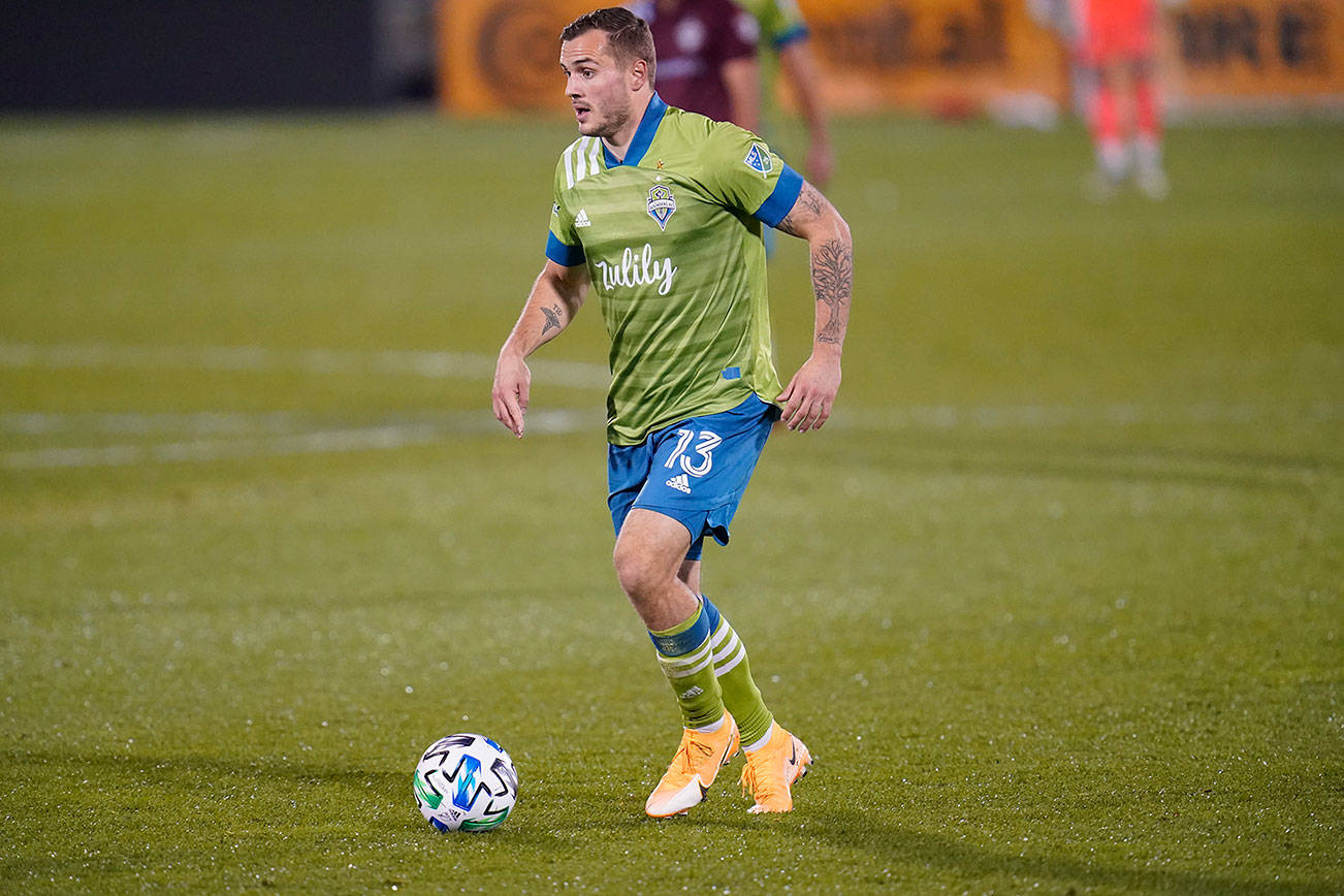 Seattle Sounders forward Jordan Morris (13) in the second half of an MLS soccer match Sunday, Nov. 1 2020, in Commerce City, Colo. The Rapids won 3-1. (AP Photo/David Zalubowski)