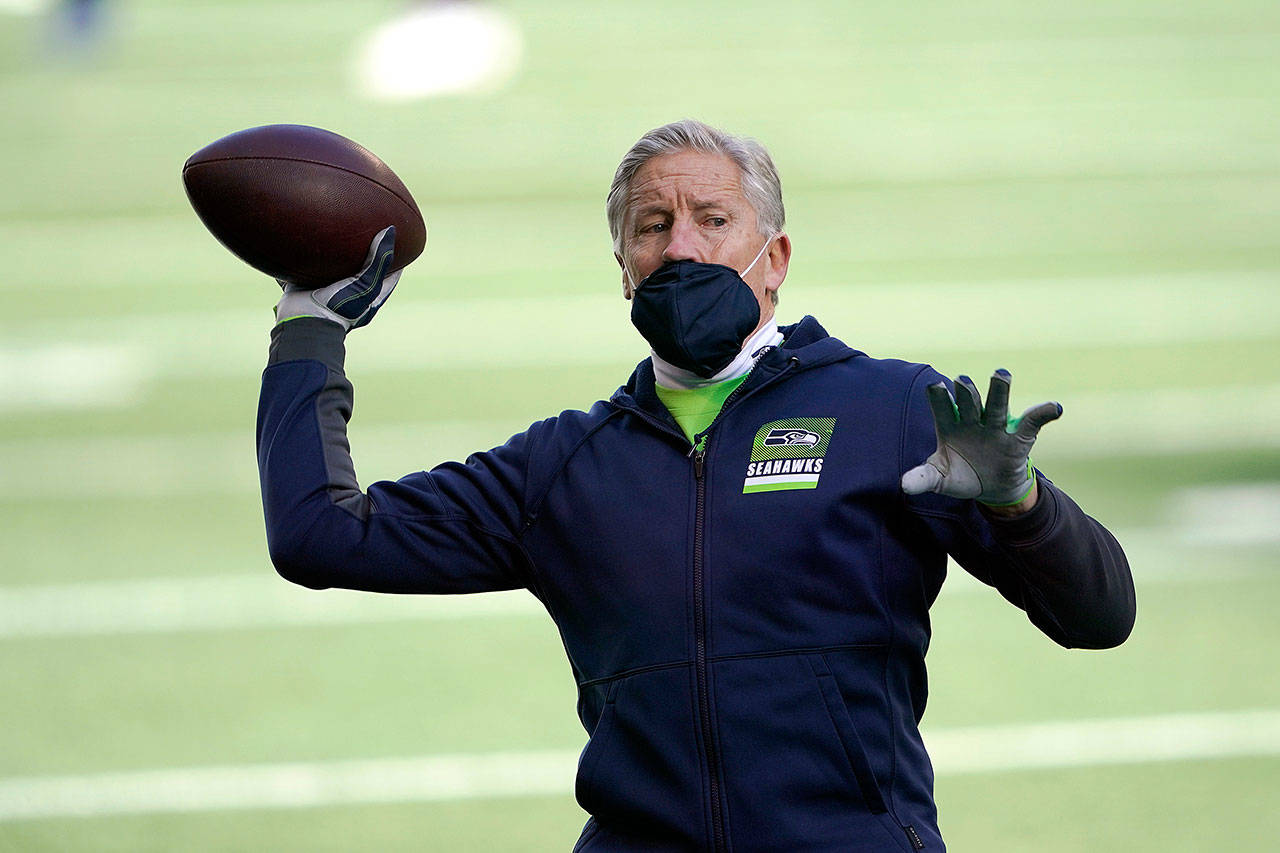 Seahawks head coach Pete Carroll has a 112-63-1 record in his 11 years in Seattle. ( Ted S. Warren / Associated Press)