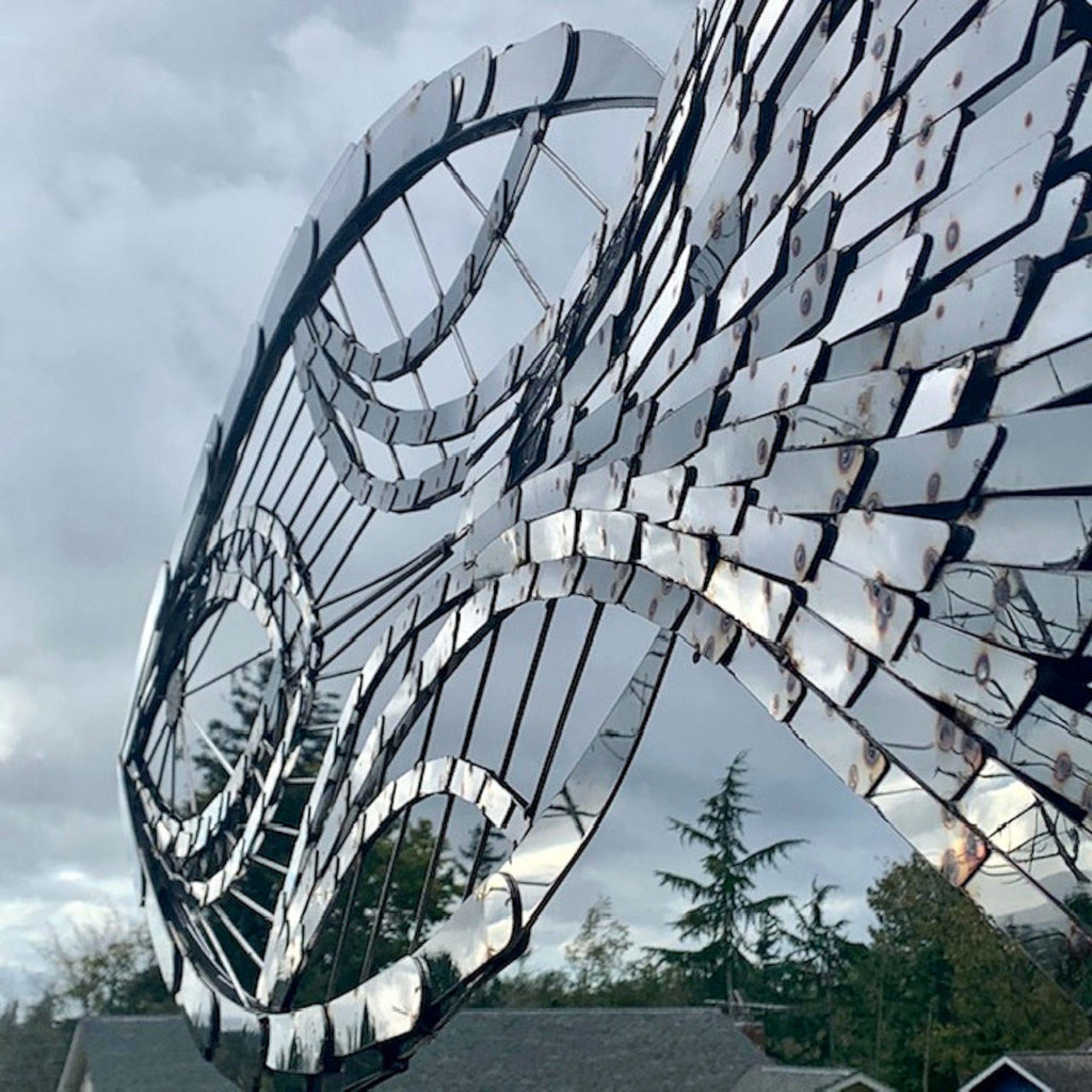 “Weather Vane II,” by Bellingham sculptor Wayne Kangas, is a scrap metal sculpture made from leftover mirrored stainless steel.

