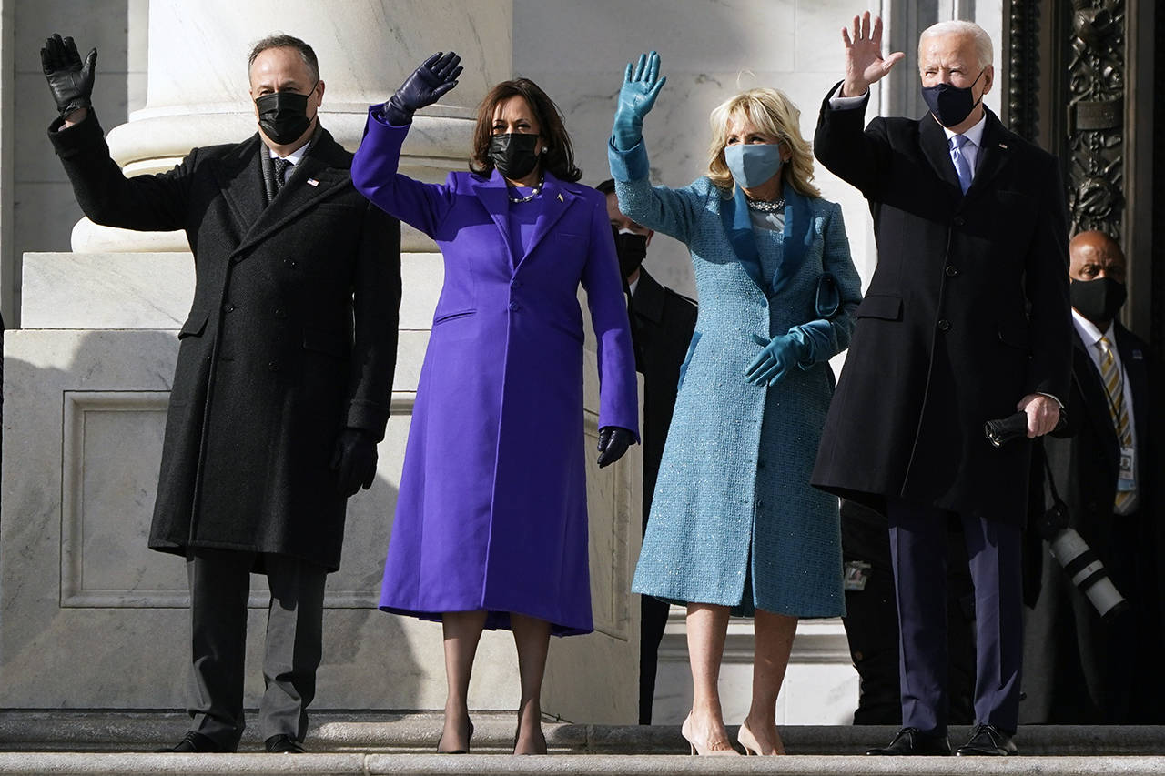 President-elect Joe Biden, his wife Jill Biden and Vice President-elect Kamala Harris and her husband Doug Emhoff arrive at the steps of the U.S. Capitol for the start of the official inauguration ceremonies, in Washington on Wednesday. (AP Photo/J. Scott Applewhite)