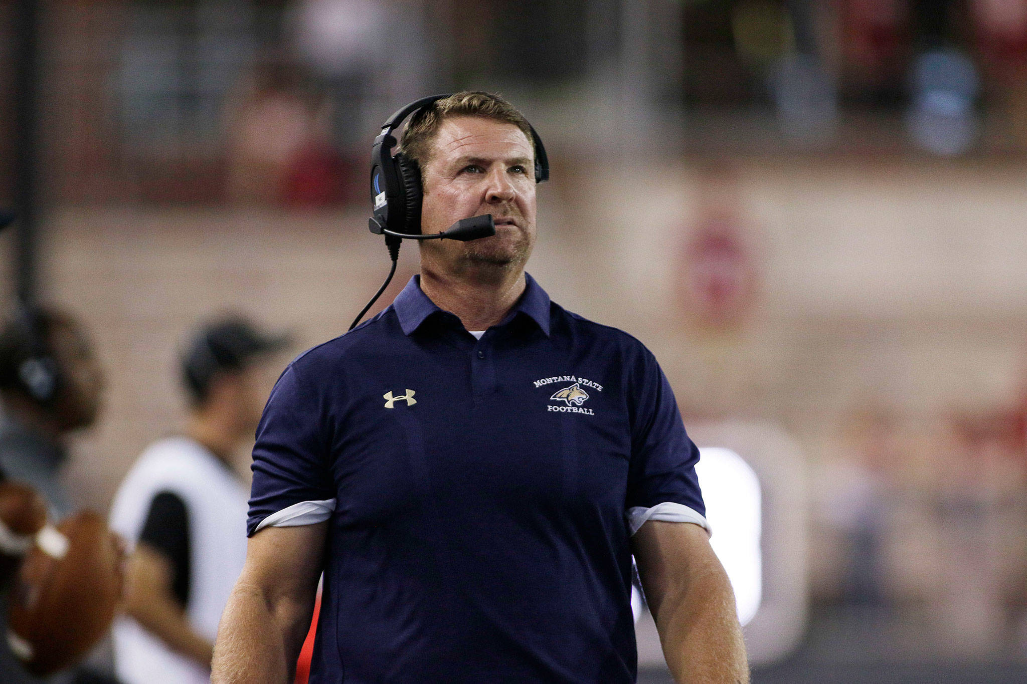 Montana State head coach Jeff Choate walks on the sideline during the first half of a game against Washington State in 2017 in Pullman. (AP Photo/Young Kwak)