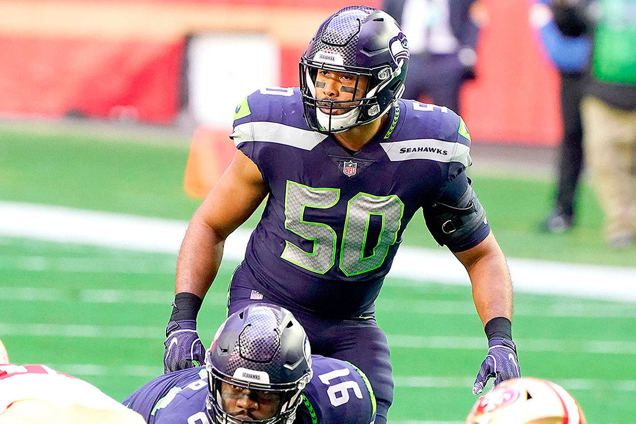 Seattle Seahawks outside linebacker K.J. Wright (50) was deemed by the readers as the most important unrestricted free agent for the team to re-sign. (AP Photo/Rick Scuteri)