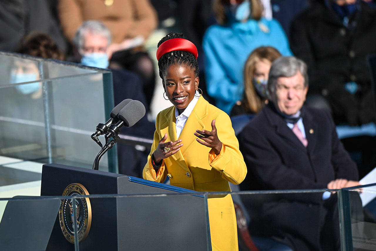 Amanda Gorman recites her poem, The Hill We Climb at the inauguration. (Jonathan Newton / Washington Post)