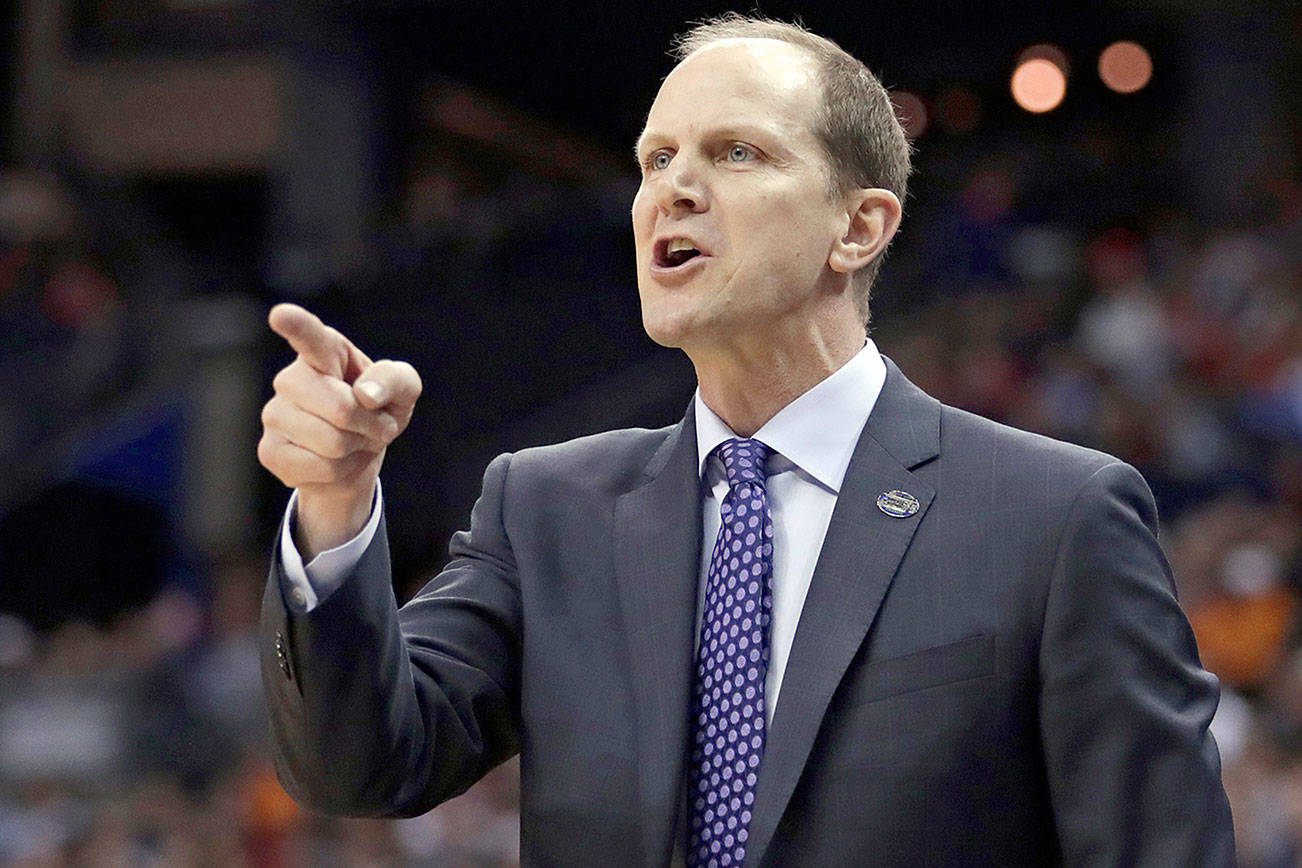 Is Mike Hopkins the right coach for the University of Washington men’s baskethall program’s long-term future? (AP Photo/Tony Dejak)