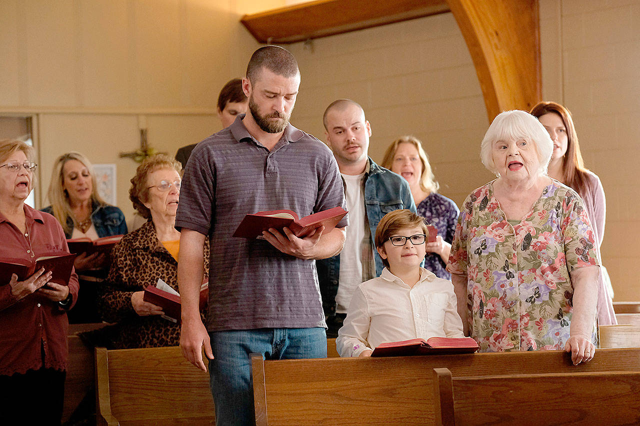 From left, Justin Timberlake plays an ex-con, Ryder Allen portrays a gender fluid boy and June Squibb is the ex-con’s grandmother in a scene from “Palmer.” (Apple TV+)