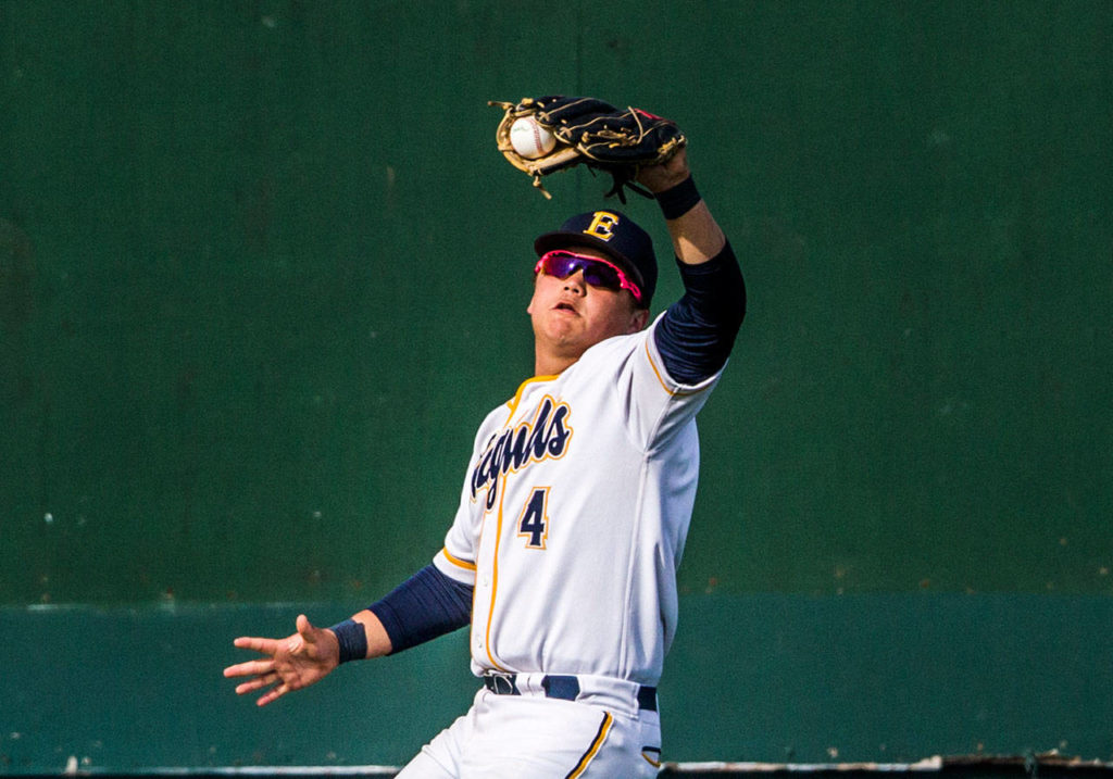 Everett’s Tyler Bates makes a catch in left field. (Olivia Vanni / The Herald)