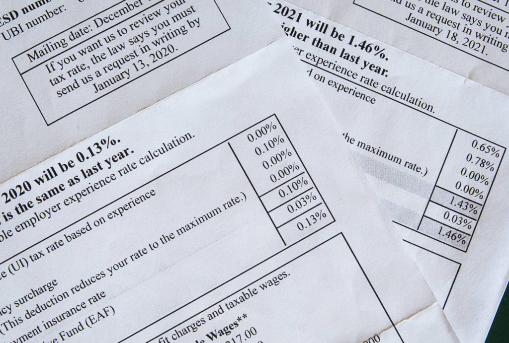 Statements from 2020 and 2021 showing a 1,000% increase in Brian Copple’s unemployment insurance taxes. (Olivia Vanni / The Herald)
