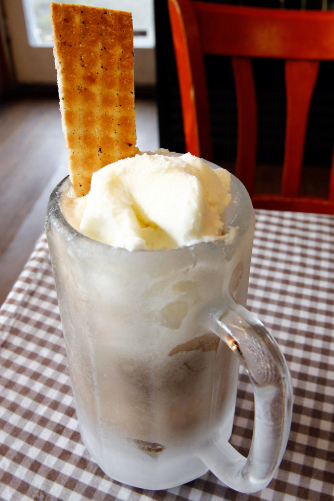 Chug’s Root Beer Store serves root beer floats in chilled mugs. (Kevin Clark/The Herald)
