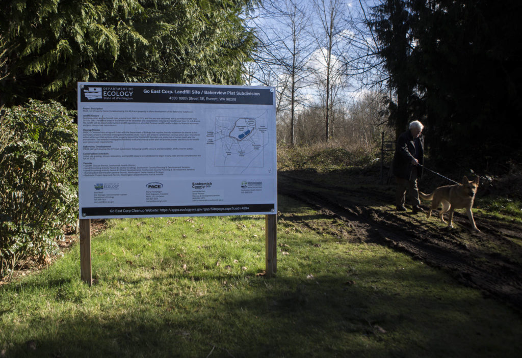 A sign with development information marks a trail into the Go East Corp. landfill site. (Olivia Vanni / The Herald) 
