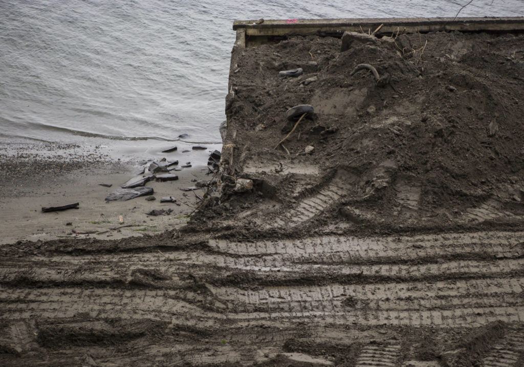 Where the beach ends and an old seawall begins north of Langley on Whidbey Island. (Olivia Vanni / The Herald) 
