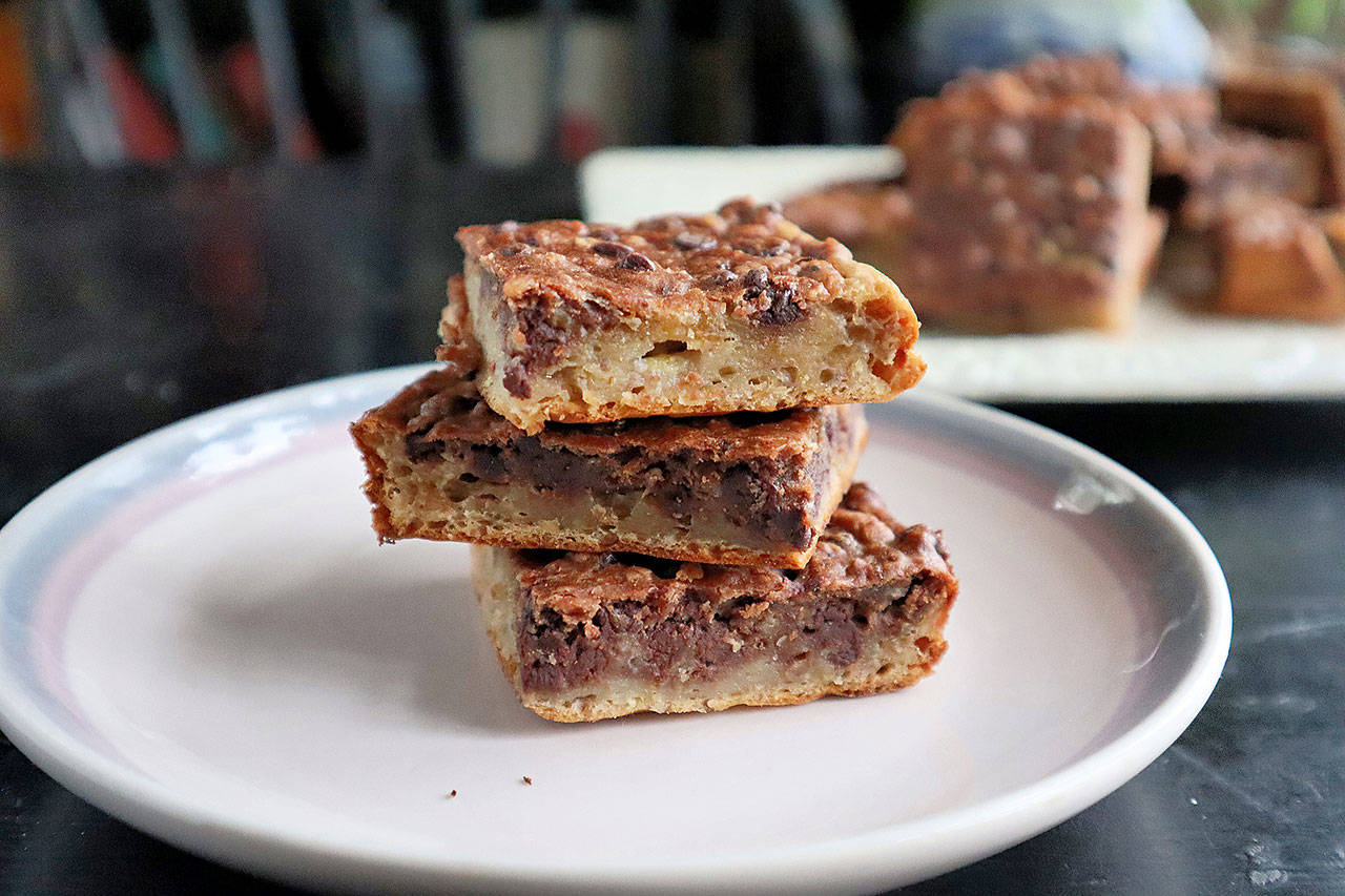 Banana bread teams up with chocolate chips and oatmeal to create a layered brownie that’s just as good for breakfast as it is dessert. (Gretchen McKay / Pittsburgh Post-Gazette)
