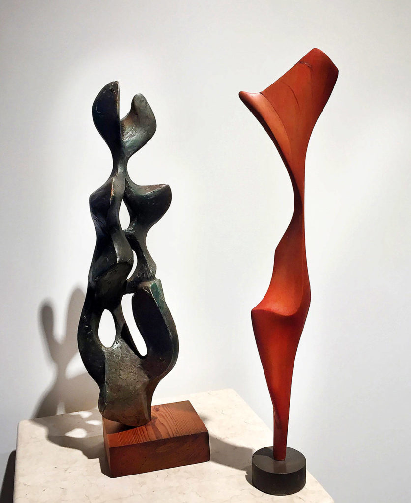 Left: Untitled, circa 1950s, painted wax. Right: Untitled, circa 1950, cedar. Both from the collection of the Charles W. Smith family.
