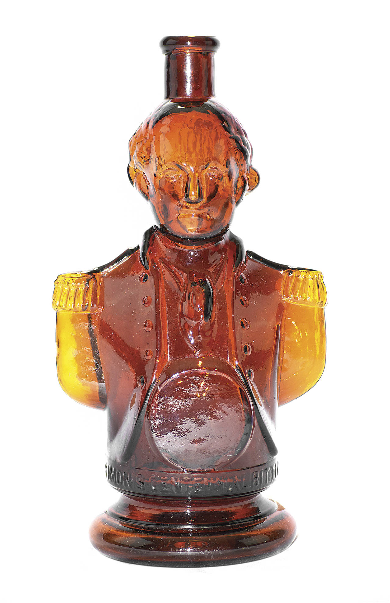 This circa 1876 Simon’s Centennial Bitters bottle represents George Washington when he was commander in chief of the Continental Army, 100 years before. The red amber shaded to yellow amber bottle is 10 inches high and auctioned for $2,640.