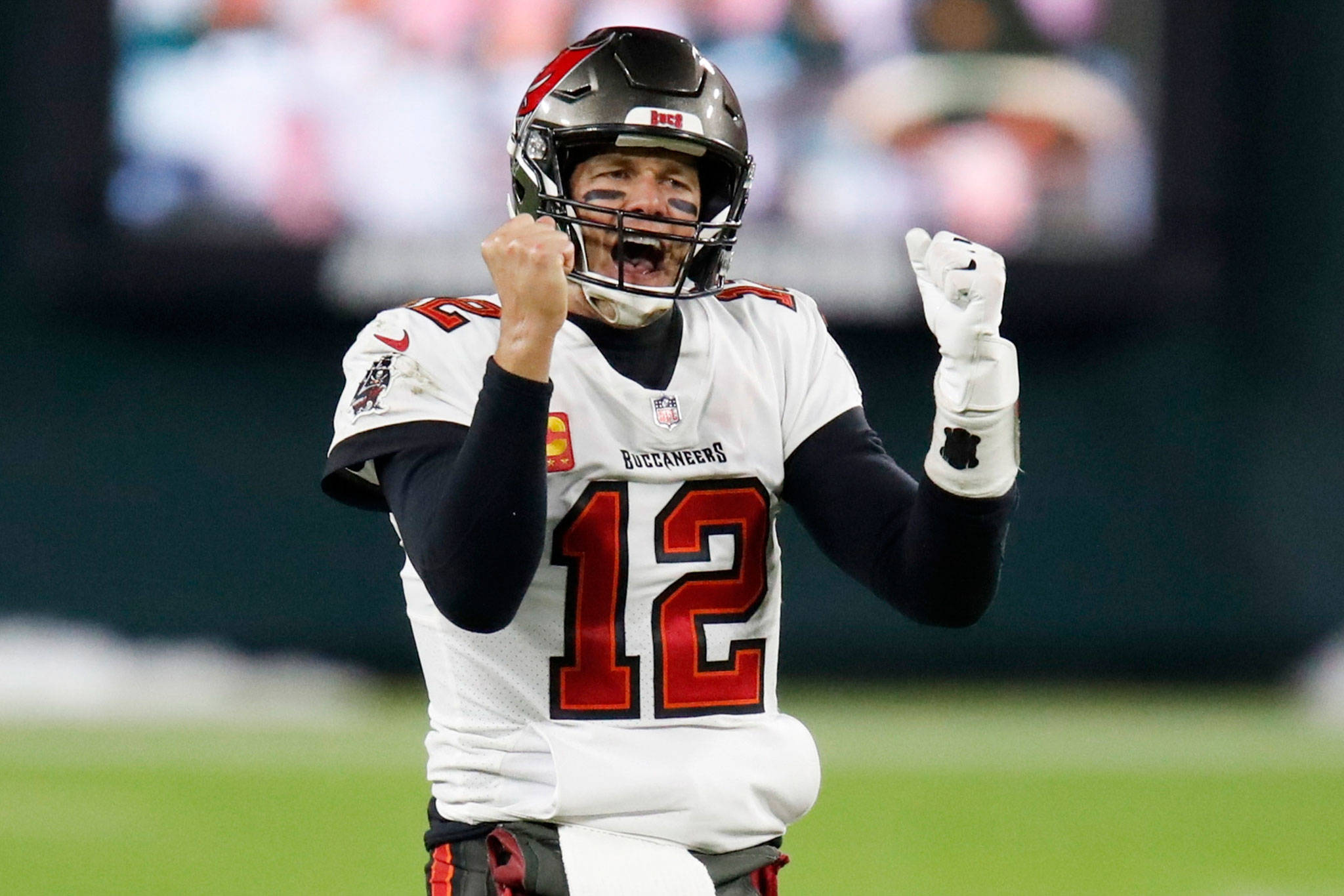 Buccaneers quarterback Tom Brady reacts after winning the NFC championship game against the Packers on Jan. 24, 2021, in Green Bay, Wis. (AP Photo/Matt Ludtke)