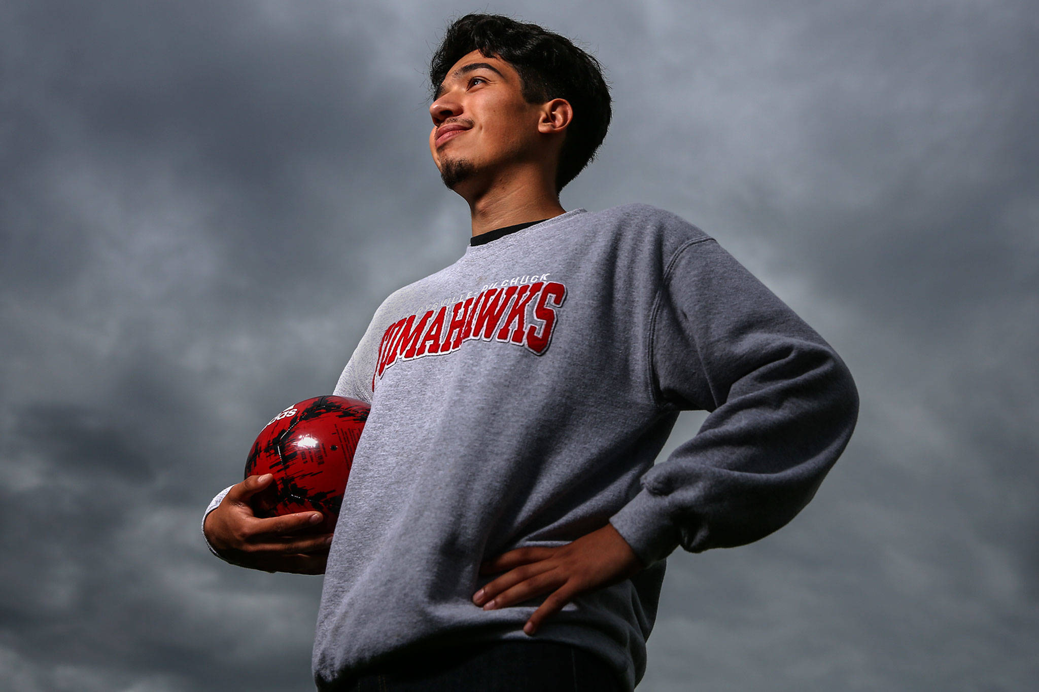 Marysville Pilchuck soccer player Edgar Martinez wears a Tomahawks sweatshirt in June of 2000. A bill in the Legislature could require the school to change its name and logo, unless the Tulalip Tribes consent to their use. (Kevin Clark / Herald file photo)