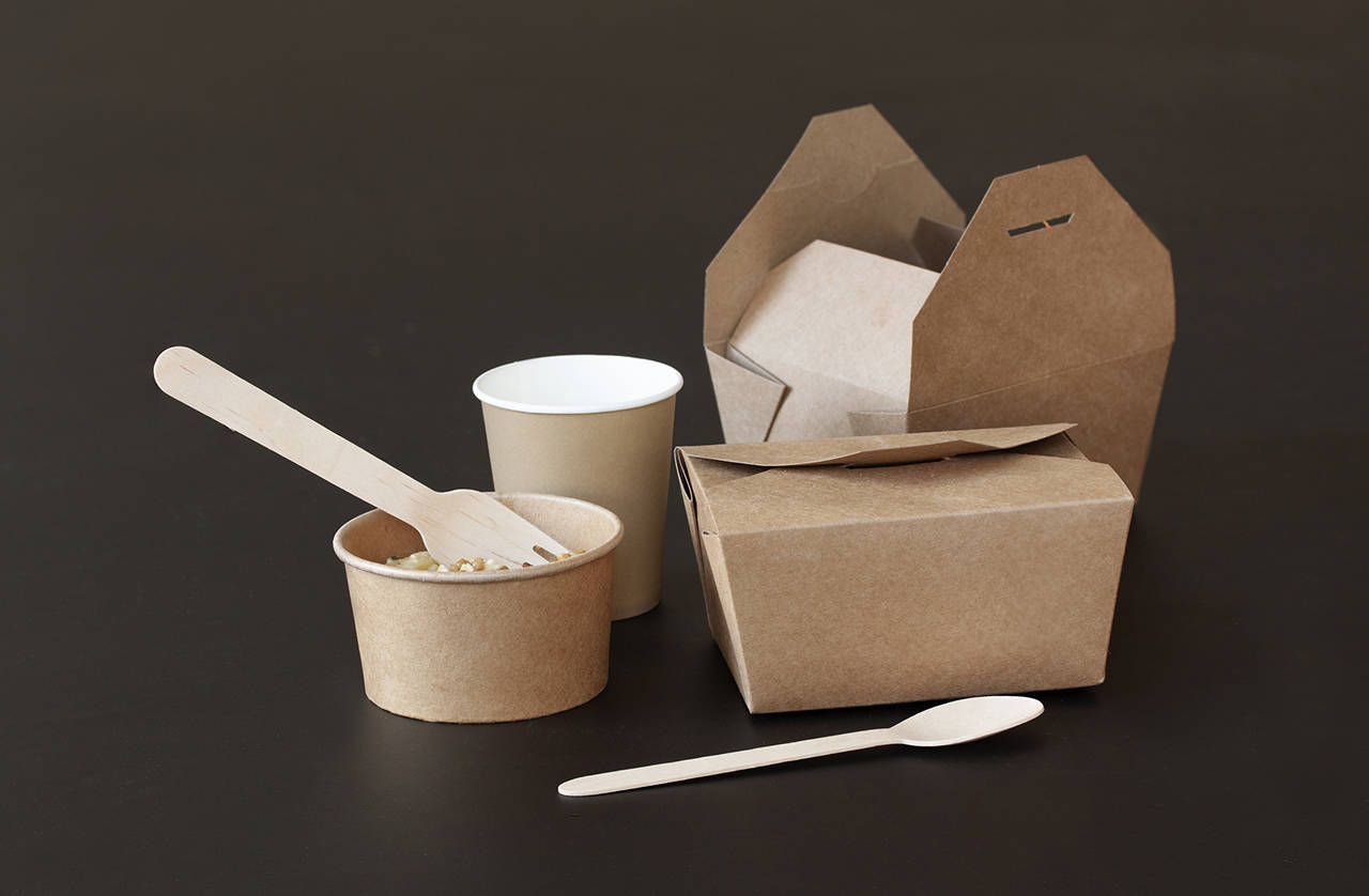 Put food-soiled paper containers without a plastic liner in the compost bin — not the recycling cart. (Getty Images)