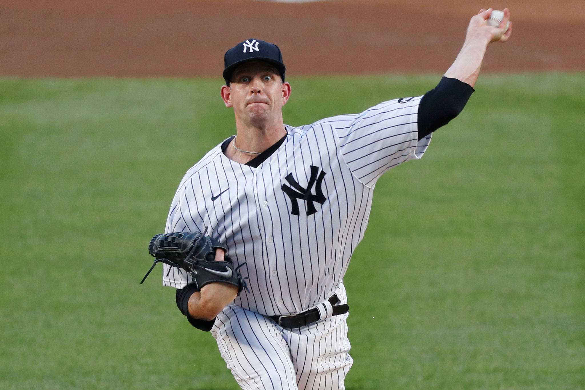 Yankees starting pitcher James Paxton throws during the first inning of a game against the Red Sox on Aug. 2, 2020, in New York. Paxton is returning to the Seattle Mariners after an injury-filled second season with New York. ( AP Photo/Kathy Willens)