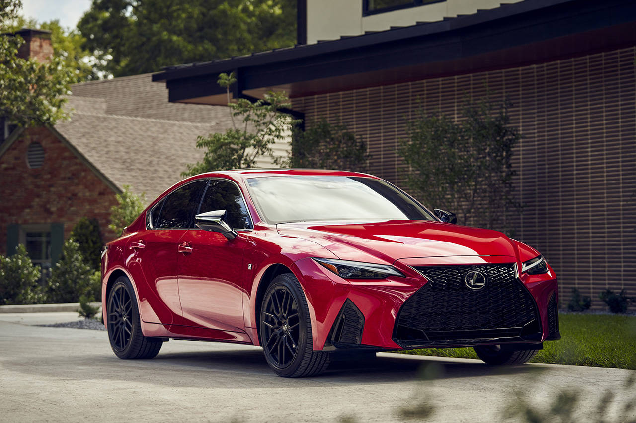 The F Sport package adds bold exterior styling cues and 19-inch dark metallic alloy wheels to the 2021 Lexus IS 350. (Manufacturer photo)