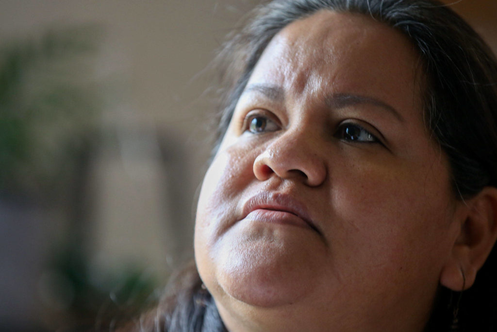 Alma López of Lake Stevens is among the many people struggling financially since she stopped receiving her unemployment payment in December because of an identity verification hiccup. (Kevin Clark / The Herald)
