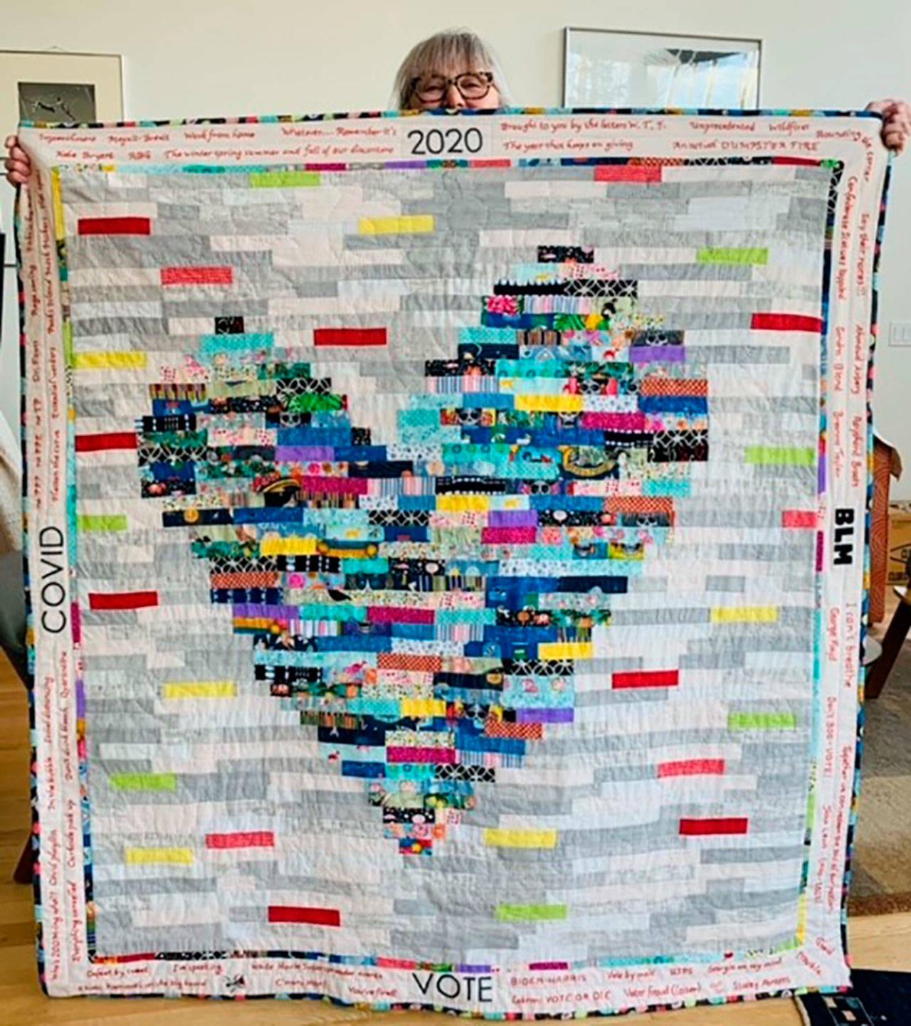 Judy Walsh of Maine created a quilt from the leftover fragments of fabric she had from making masks. (Courtesy of Judy Walsh)