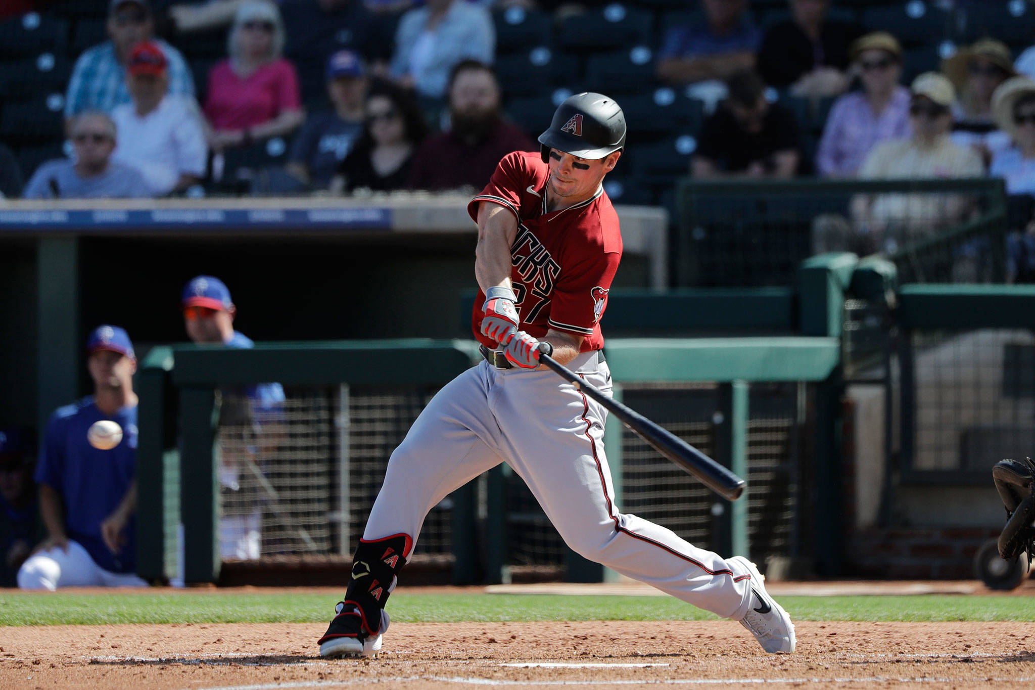 Former Jackson High School star Travis Snider singles during a spring training game with the Diamondbacks on March 5, 2020, in Surprise, Ariz. (AP Photo/Elaine Thompson)