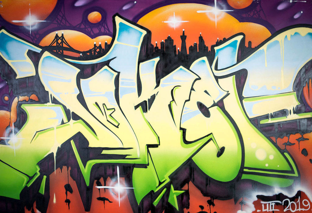 Joker, of the group Under the Influence, painted “Skyline,” which is featured in the “Prophets, Teachers and Kings” documentary.
