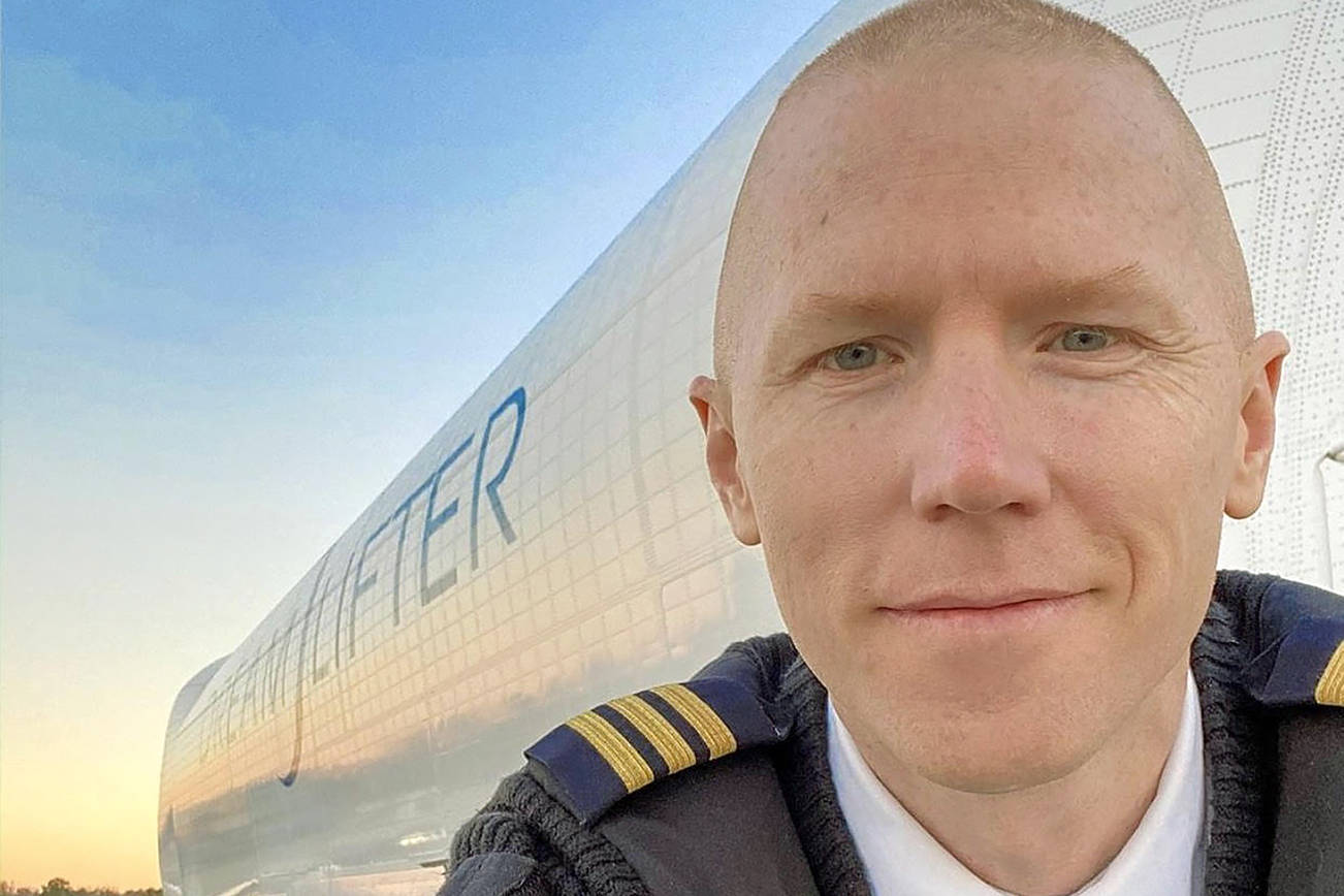 Kelsey Hughes -- Pilot Kelsey -- is a 747 pilot and the producer of 74 Gear, a YouTube channel for aviation fans. Hughes is in front of a 747 Dreamlifter at John F. Kennedy International Airport in New York City on January 26, 2020 Photo Credit: Kelsey Hughes