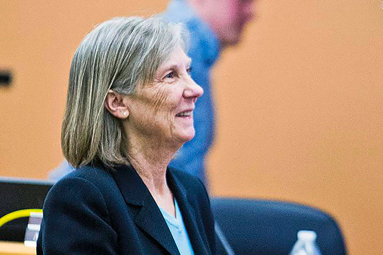 Jean Shumate (left), seen here during a February 2019 school board meeting, will retire June 30 after 20 years at the Stanwood-Camano School District superintendent. (Skagit Valley Herald)
