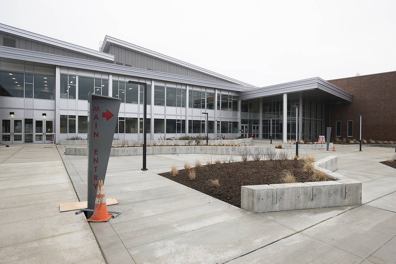 The main entrance of Stanwood High School. A new law will allow high schools to waive some requirements for students on track to graduate but in danger of not making it due to the ongoing pandemic. (Andy Bronson / Herald file)