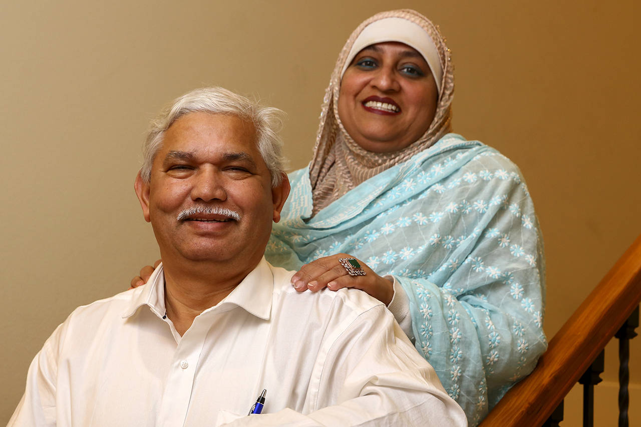 Riaz Khan with his wife, Ayesha Khan. (Kevin Clark / Herald file)