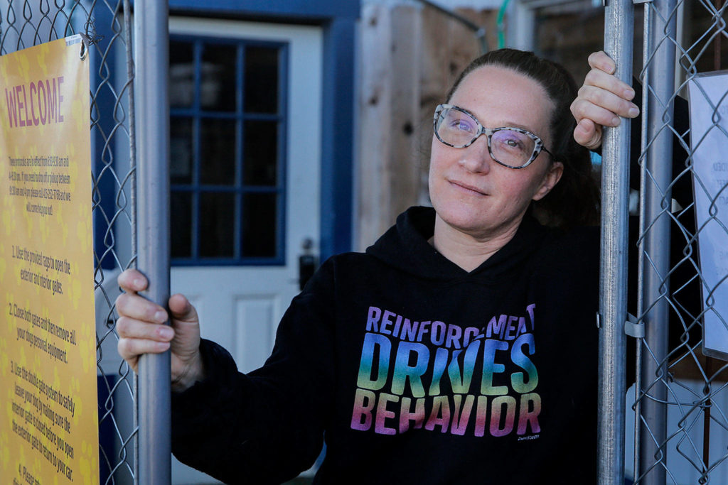 Jennifer Cross, The Dog Spot owner, supports the no-sit, no-lie ordinance, saying it’s a balance between the needs of the homeless and business owners. (Kevin Clark / The Herald)
