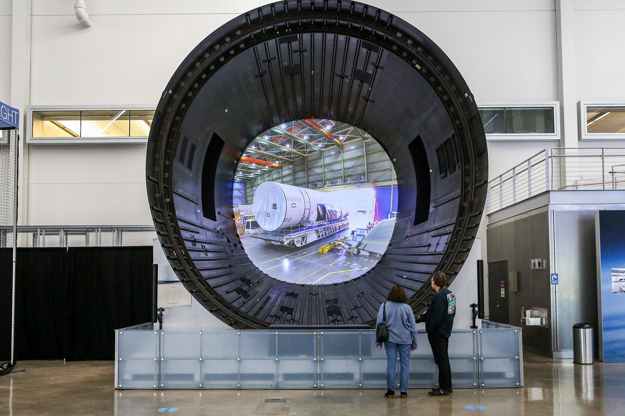 Patrons view the 787 exhibit at the Boeing Future of Flight at Paine Field on Oct. 8, 2020. (Kevin Clark / Herald file)