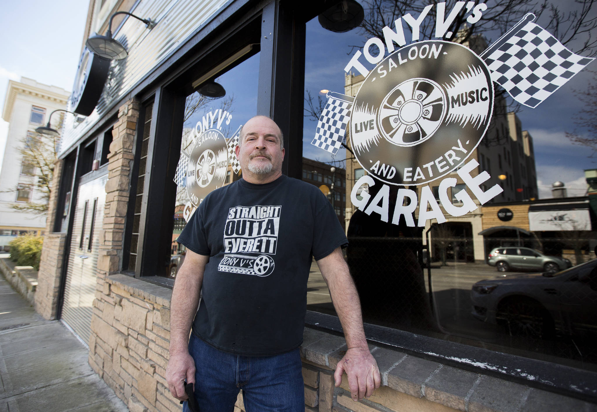 Tony Verhey, owner of Tony V’s Garage, outside of the new bar front on March 23 in Everett. (Olivia Vanni / The Herald)