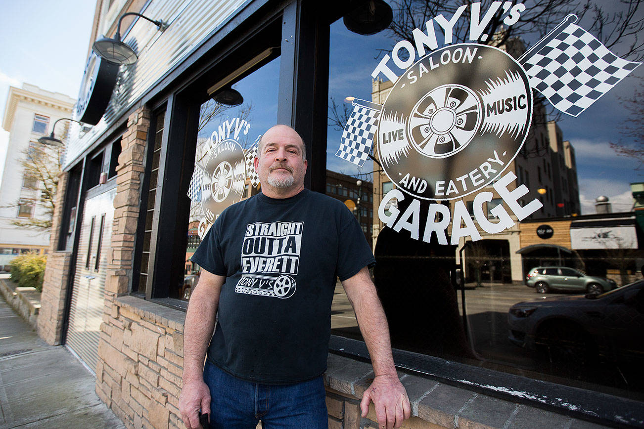 Tony Verhey, owner of Tony V's Garage, outside of the brand new bar front on Tuesday, March 23, 2021 in Everett, Wa. (Olivia Vanni / The Herald)