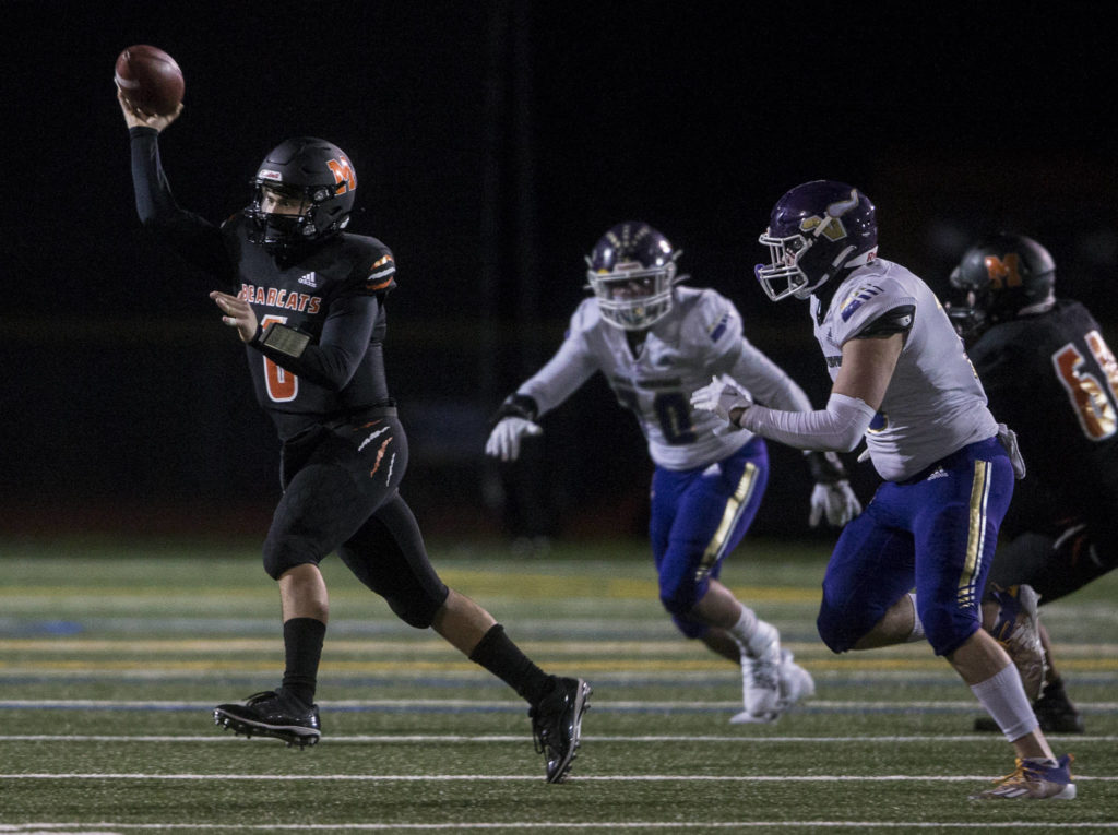 Monroe’s Brycen Blankenship throws a pass during the game against Lake Stevens on Friday, March 12, 2021 in Monroe, Wa. (Olivia Vanni / The Herald)
