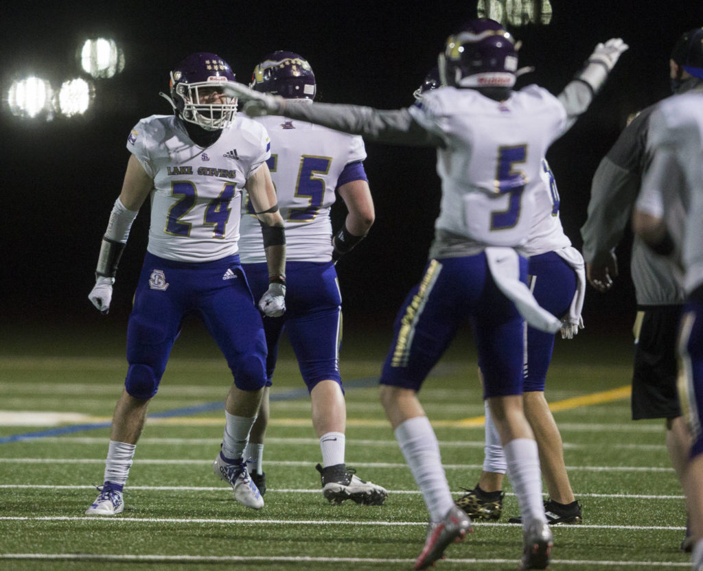 Lake Stevens’ Tyler Lutz celebrates after stopping pass during the game against Monroe on Friday, March 12, 2021 in Monroe, Wa. (Olivia Vanni / The Herald)
