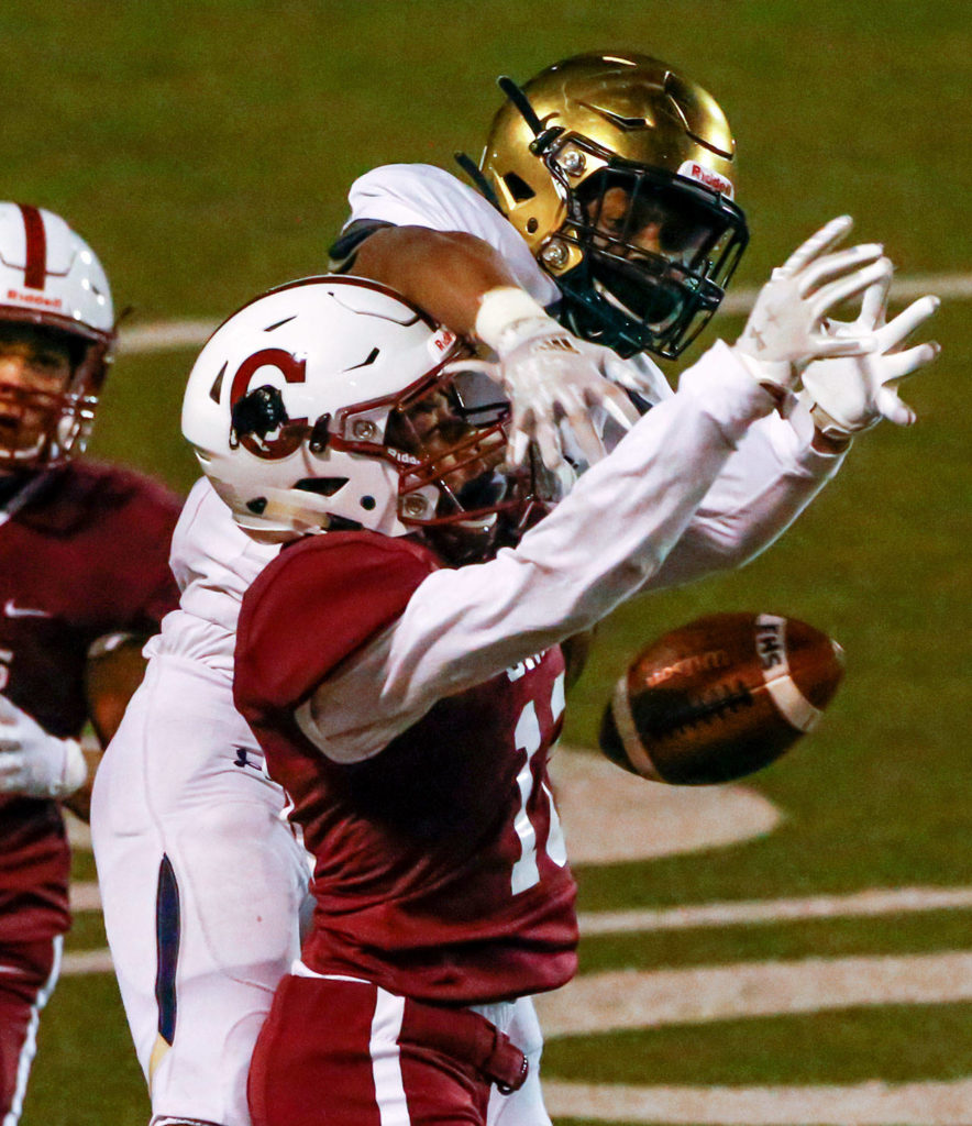 The annual Battle of Broadway between Everett High and Cascade High at Everett Memorial Stadium Friday night on March 19, 2021. (Kevin Clark / The Herald)
