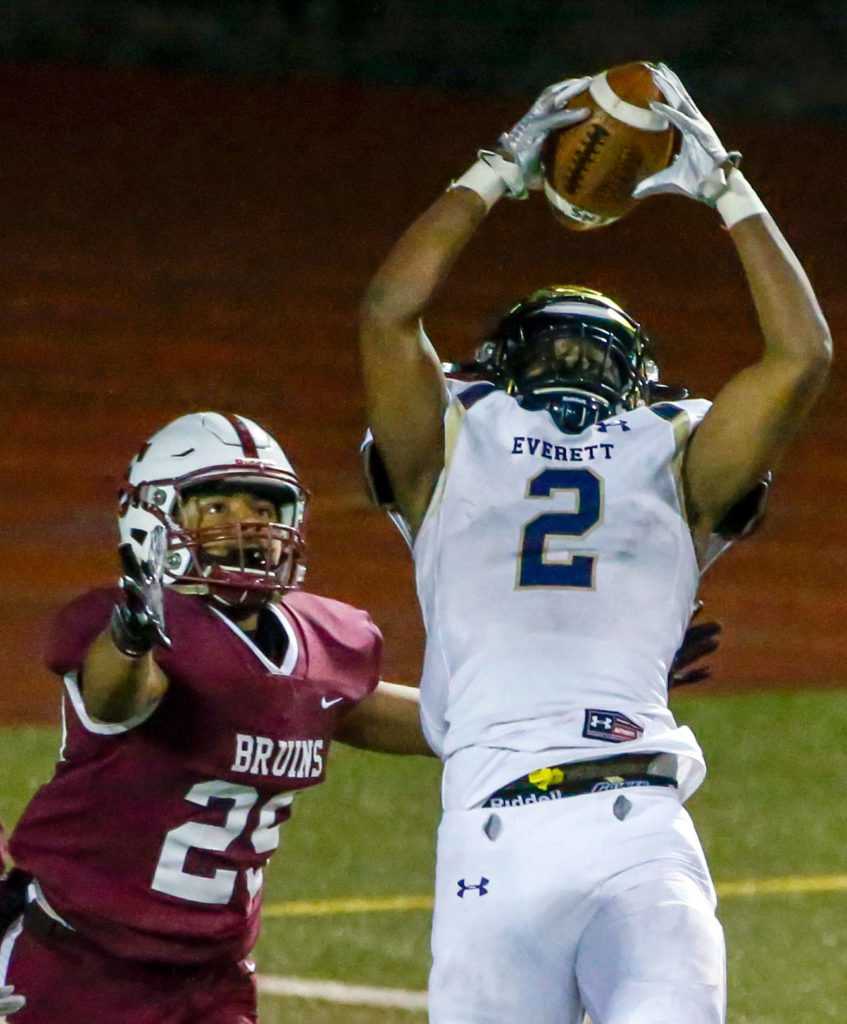 The annual Battle of Broadway between Everett High and Cascade High at Everett Memorial Stadium Friday night on March 19, 2021. (Kevin Clark / The Herald)
