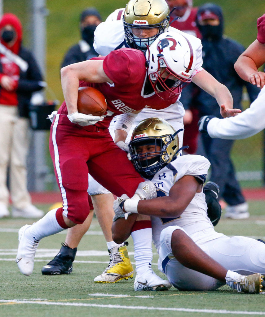 The annual Battle of Broadway between Everett High and Cascade High at Everett Memorial Stadium Friday night on March 19, 2021. (Kevin Clark / The Herald)
