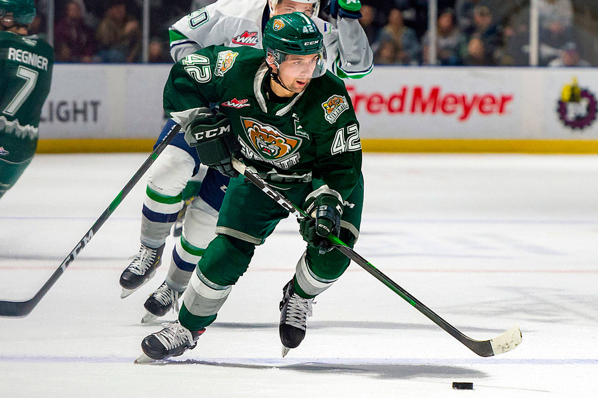 The Silvertips’ Cole Fonstad drives up the ice during a game against the Thunderbirds in 2019 at the ShoWare Center in Kent. (Brian Liesse / Seattle Thunderbirds)