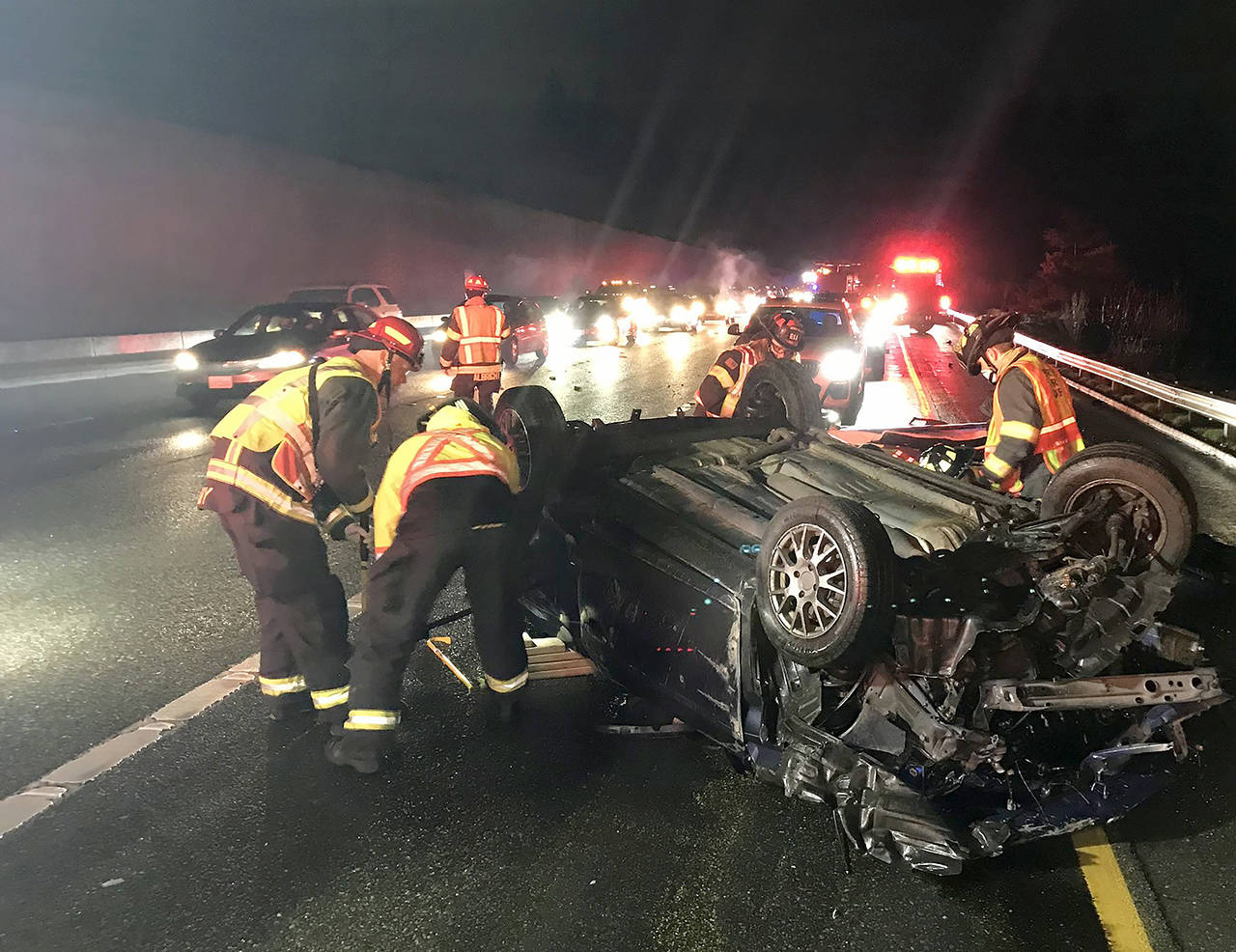 A man died and a woman was hospitalized Sunday night after a car crash on southbound I-5 in Everett. (Washington State Patrol)