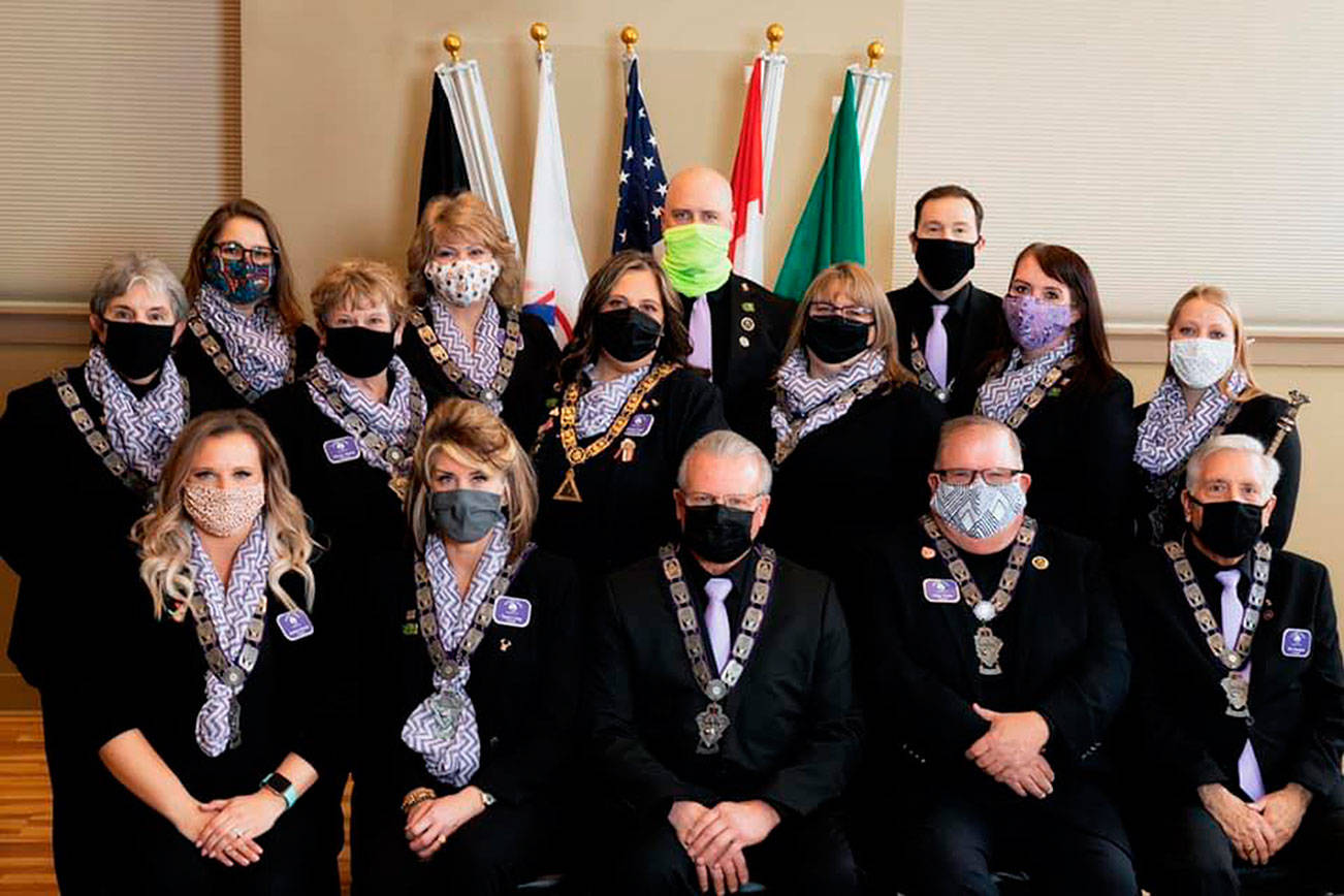 Everett Elks Lodge #479 officers. Front row (left to right): Jessica Mumm, Tessa Long, Paul Clark, Greg Tisdel, Bill Douglas. Middle row: Debbie Ritchie, Nancy Wolke, Wendy Cook, Jennifer Ozbun, Jenny Steele, Mary Thomas. Back row: Beth Beecher, Valerie Anderson, Aaron Reid, Danen Barnhart. (Everett Elks)