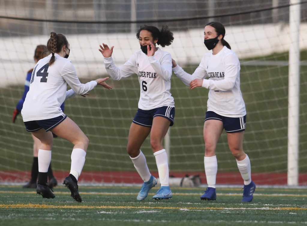 Glacier Peak’s Aaliyah Collins (6) celebrates her goal with teammates in the first half of the season finale against Snohomish on Monday at Veterans Memorial Stadium in Snohomish. (Andy Bronson / The Herald)
