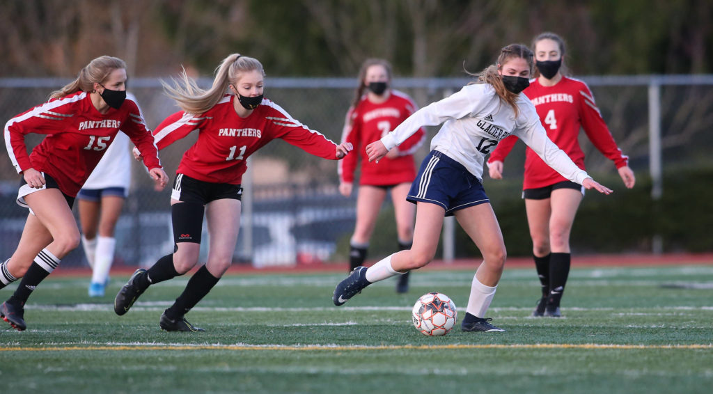 Glacier Peak and Snohomish meet in a girls soccer match at Veterans Memorial Stadium on Monday in Snohomish. (Andy Bronson / The Herald)
