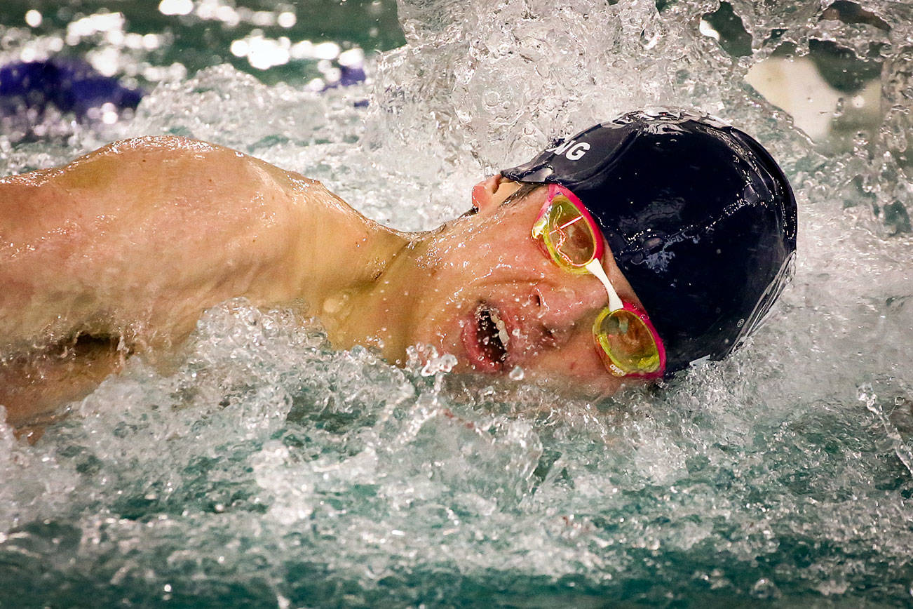 Glacier Peak's Matthew King competes in the 100 yard freestyle during the 4A NW District Swim Meet Saturday afternoon at Snohomish Aquatic Center in Snohomish on February 15, 2020. The  (Kevin Clark / The Herald)