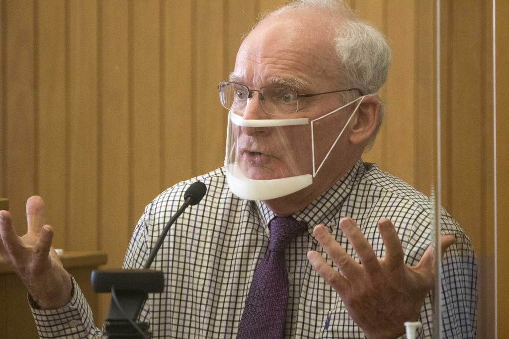 Simeon Berkley describes his fear of another driver’s behavior as testifies in his defense at the Snohomish County Courthouse on Tuesday in Everett. (Andy Bronson / The Herald)
