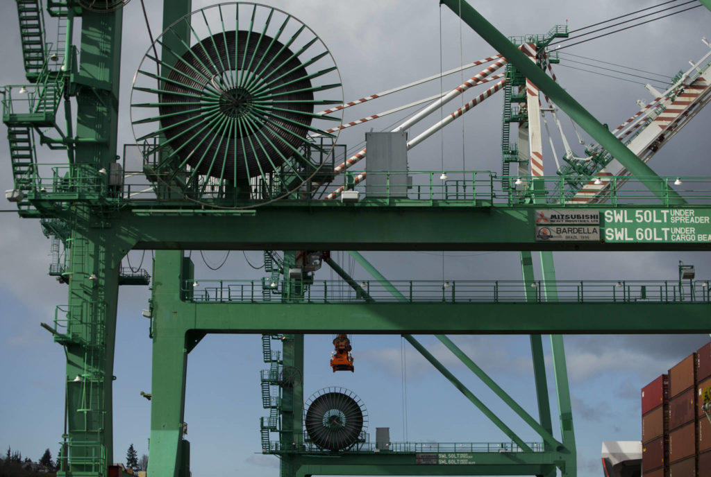 The two cranes at the South Terminal of the Port of Everett on Thursday. (Olivia Vanni / The Herald)
