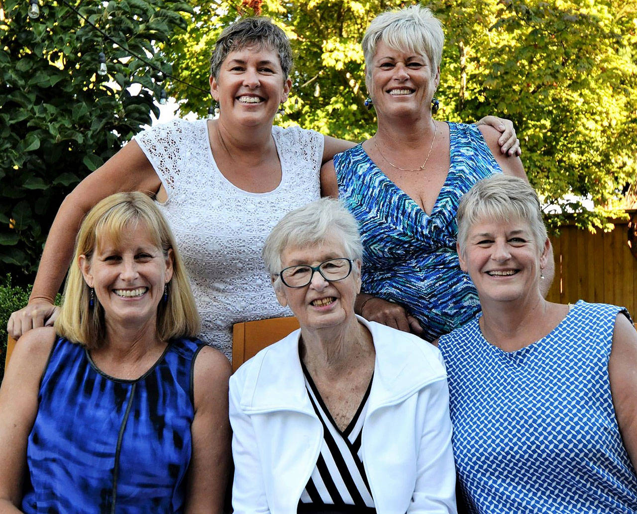 Jeanne Metzger (center, bottom row) on her 85th birthday with daughters Maddy Metzger-Utt (top left), Jo Metzger-Levin (top right), Meg Metzger (bottom left) and Jan Brossman (bottom right). A longtime Herald editor, Jeanne Metzger died Wednesday at age 89. (Contributed photo)