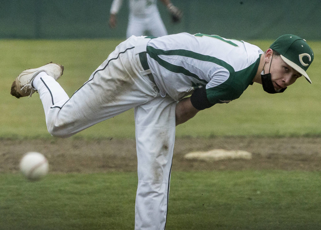 Marysville Getchell’s Bradley Johnson pitches the ball during a game against Marysville Pilchuck on April 7, 2021, in Marysville. (Olivia Vanni / The Herald)
